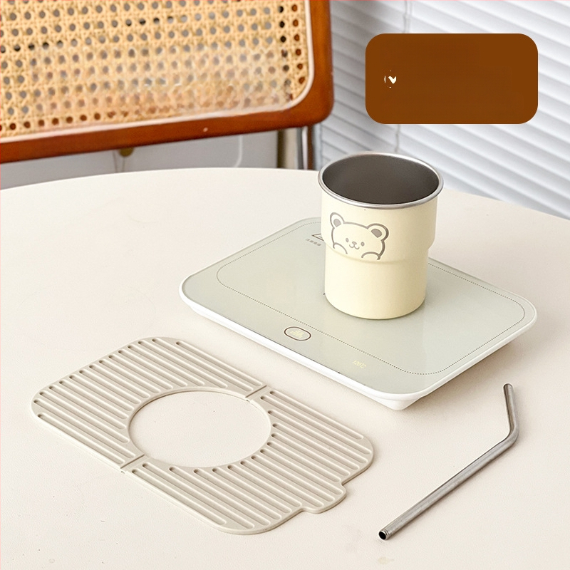 Gudra podstavka ar konstantu temperatūru mājas un biroja vajadzībām – ABS korpuss, ārēja barošanas avots, skārienvadība, automātiska izslēgšana, 6 temperatūras līmeņi