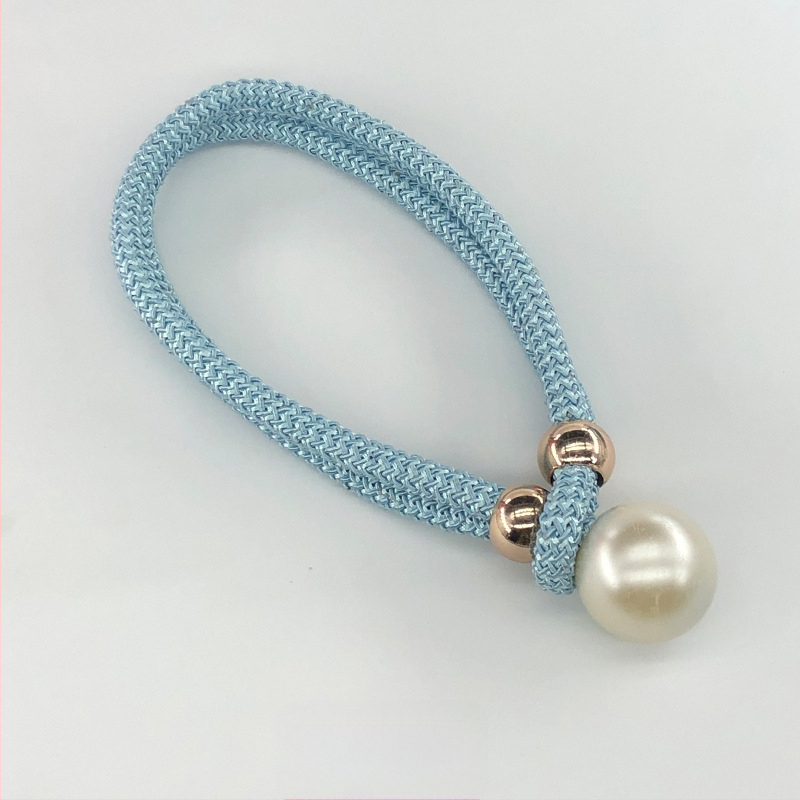 Audinių užuolaidų raišteliai su perlų akcentais, reguliuojami surišimo dirželiai, lengvas prabangos stilius