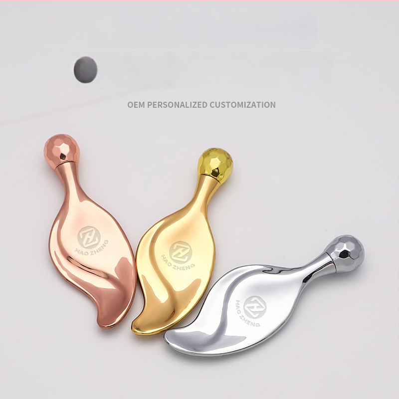 Lapai formos viengubo kamuoliuko grožio masažo įrankis su metalo voleliu, cinko lydinys, rankinis naudojimas