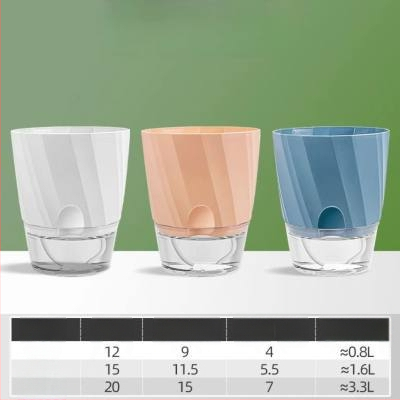 Gėlių vazonas su automatinio laistymo sistema, skaidra plastiko medžiaga, atsparus korozijai ir patvarus; tinkamas staliniam ar grindų naudojimui, šiaurietiškas minimalistinis dizainas, gaminamas liejant į vieną dalį.