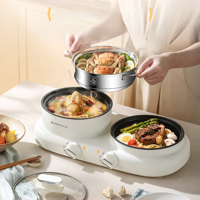 Elektriline mitmekülgne kuum pot üksuses, 600 W, maht 2 L, funktsioonid: aurutamine, praadimine, keetmine, hautamine, kuum pot; plastkorpus; kuivusvastane funktsioon