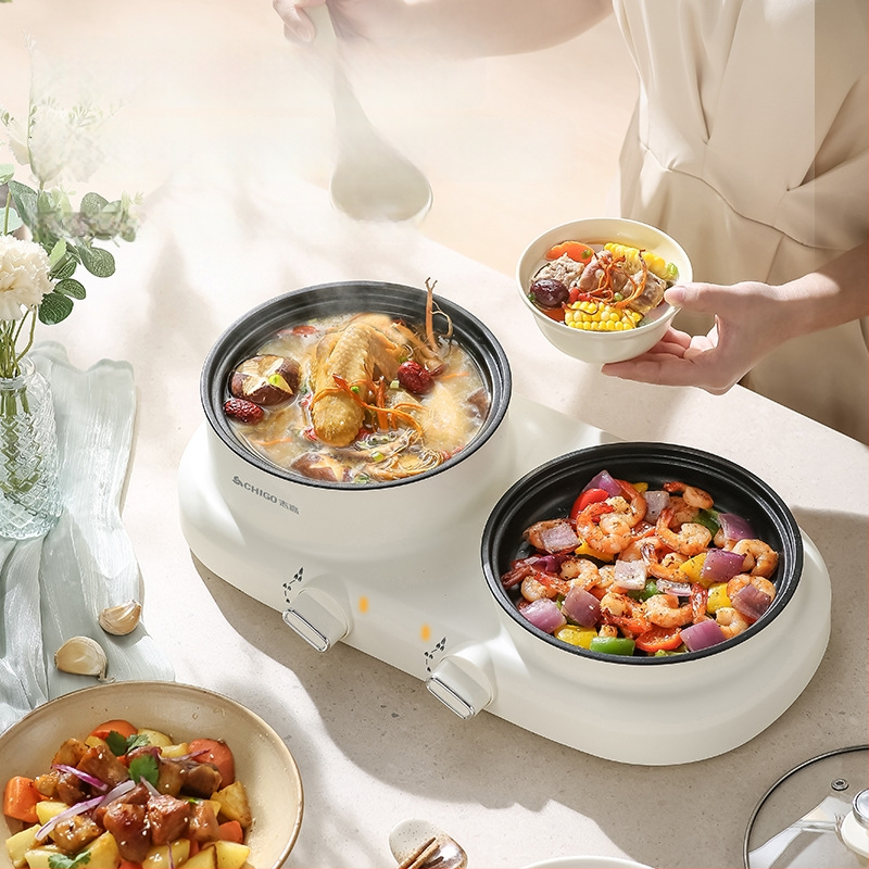 Elektriline mitmekülgne kuum pot üksuses, 600 W, maht 2 L, funktsioonid: aurutamine, praadimine, keetmine, hautamine, kuum pot; plastkorpus; kuivusvastane funktsioon