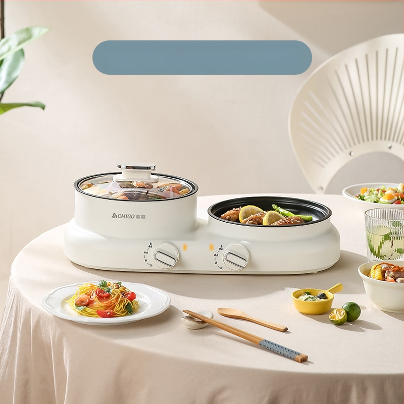 Elektriline mitmekülgne kuum pot üksuses, 600 W, maht 2 L, funktsioonid: aurutamine, praadimine, keetmine, hautamine, kuum pot; plastkorpus; kuivusvastane funktsioon