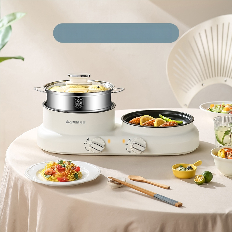 Elektriline mitmekülgne kuum pot üksuses, 600 W, maht 2 L, funktsioonid: aurutamine, praadimine, keetmine, hautamine, kuum pot; plastkorpus; kuivusvastane funktsioon