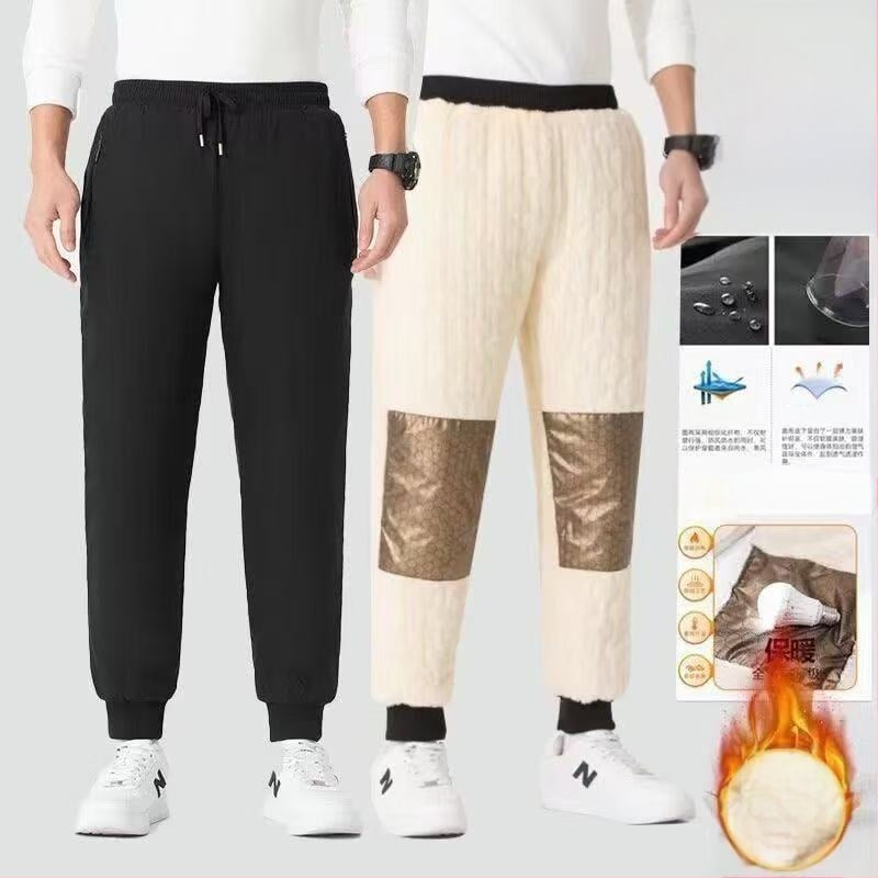 Meeste talve spordipüksid fleece-voodriga, vaba lõige, keskmine talje, köidiku sulgemine, polüesterkangas