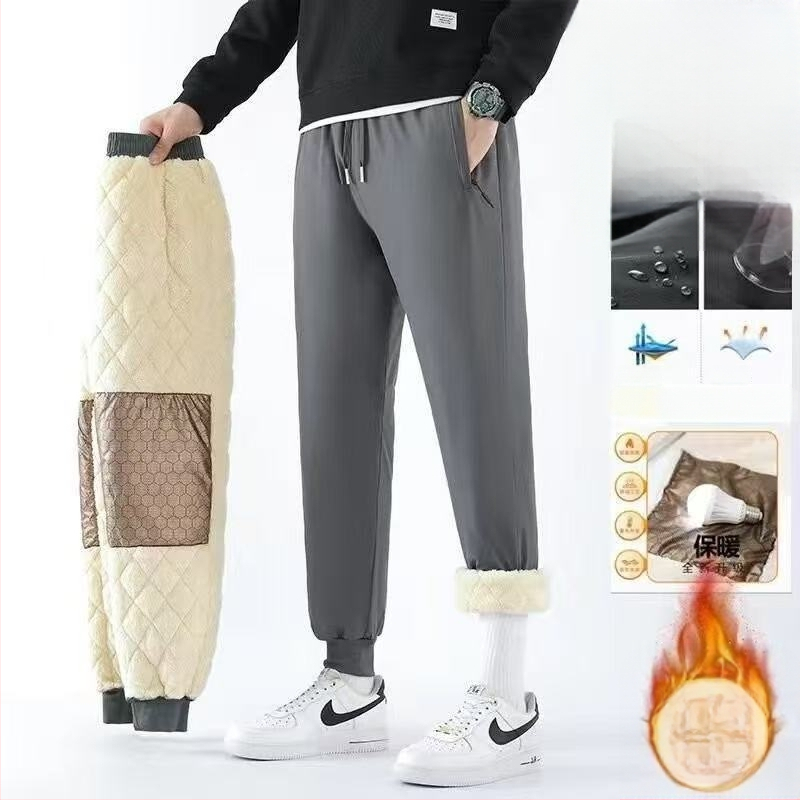 Meeste talve spordipüksid fleece-voodriga, vaba lõige, keskmine talje, köidiku sulgemine, polüesterkangas