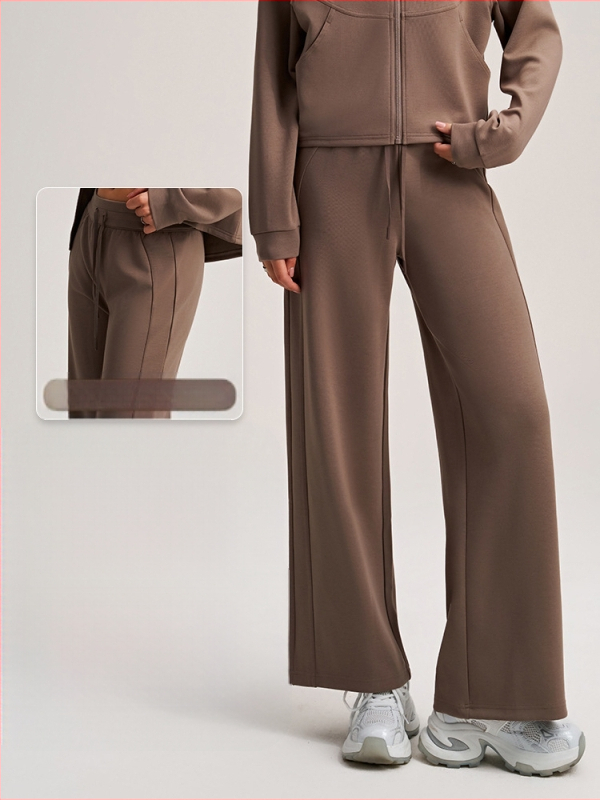 Kelnės su aukštu juosmeniu, tiesus laisvas kirpimas, rayon oro sluoksnio audinys; poliesteris 81%, viskozė 15%, spandansas 4% (Hyosung)