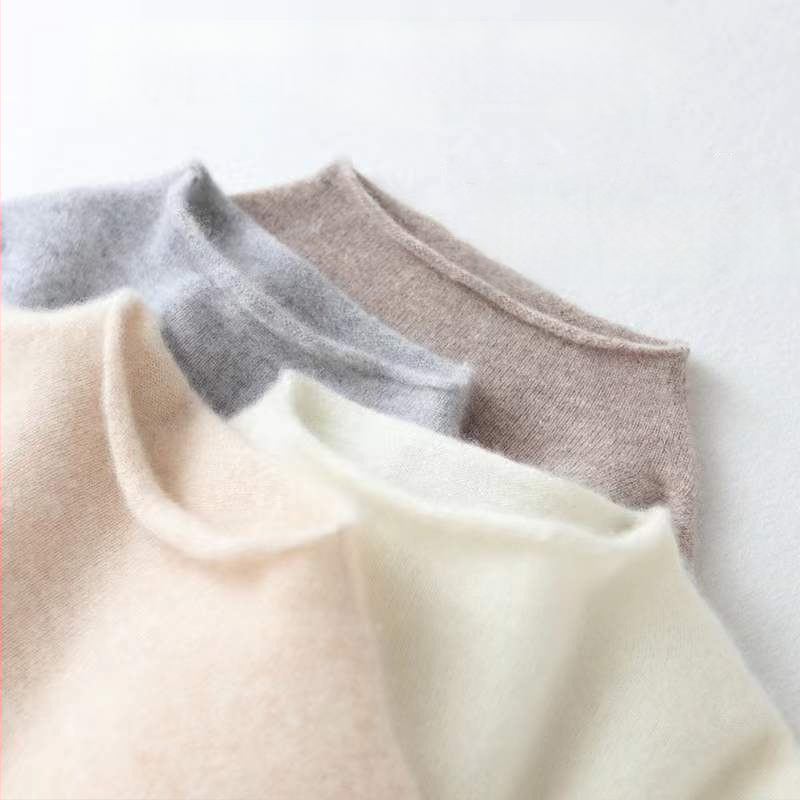 Moteriškas vilnos džemperis su stovinčia apykakle, vienarūšis raštas, ilgomis rankovėmis, siauras kirpimas (Sudėtis: vilna >95%; Raštas: vienarūšis; Apykaklė: stovinti; Rankovės: ilgos; Kirpimas: siauras)