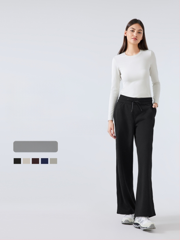 Moterų žieminės sportinės kelnės su aukštu liemeniu, laisvas kirpimas, medvilnės mišinio audinys (28% medvilnė), be pamušalo, išlaiko šilumą, tinka bėgimui ir treniruotėms