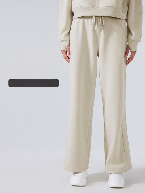 Moterų žieminės sportinės kelnės su aukštu liemeniu, laisvas kirpimas, medvilnės mišinio audinys (28% medvilnė), be pamušalo, išlaiko šilumą, tinka bėgimui ir treniruotėms