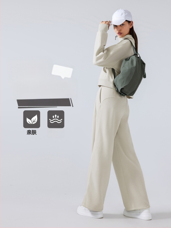 Moterų žieminės sportinės kelnės su aukštu liemeniu, laisvas kirpimas, medvilnės mišinio audinys (28% medvilnė), be pamušalo, išlaiko šilumą, tinka bėgimui ir treniruotėms