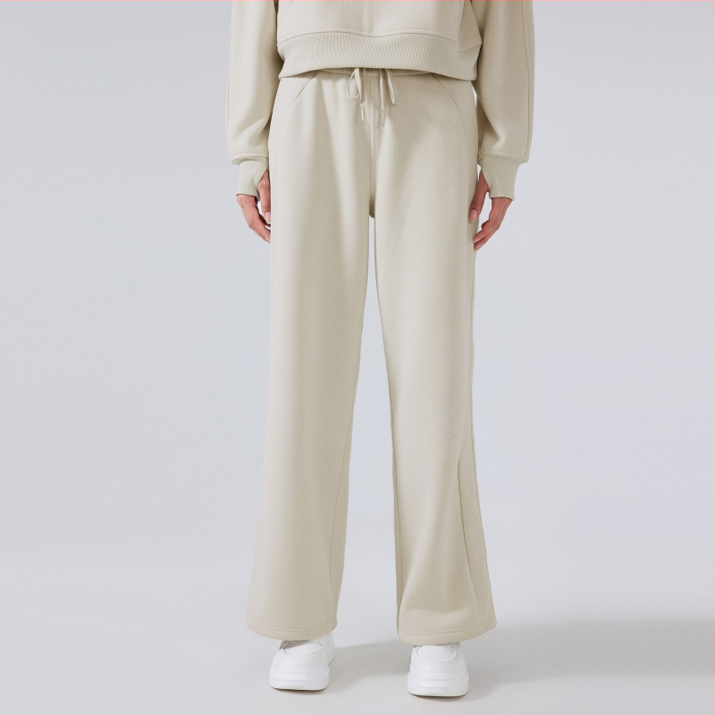 Moterų žieminės sportinės kelnės su aukštu liemeniu, laisvas kirpimas, medvilnės mišinio audinys (28% medvilnė), be pamušalo, išlaiko šilumą, tinka bėgimui ir treniruotėms