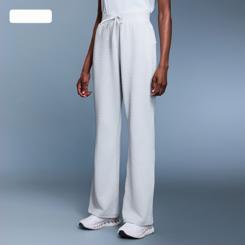 Vaflės tekstūros sportinės kelnės laisvo kirpimo, aukštas juosmuo, medvilnės–poliesterio mišinys 95%, kvėpuojančios, moterims, rudens sezonui