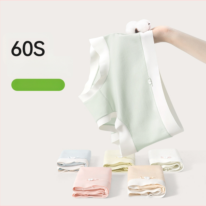 Moteriški medvilniniai apatininiai su vidutiniu juosmeniu, antibakteriniai ir kvėpuojantys; pagrindinis audinys 80–90% medvilnė; tarpinės įdėklas 100% medvilnė