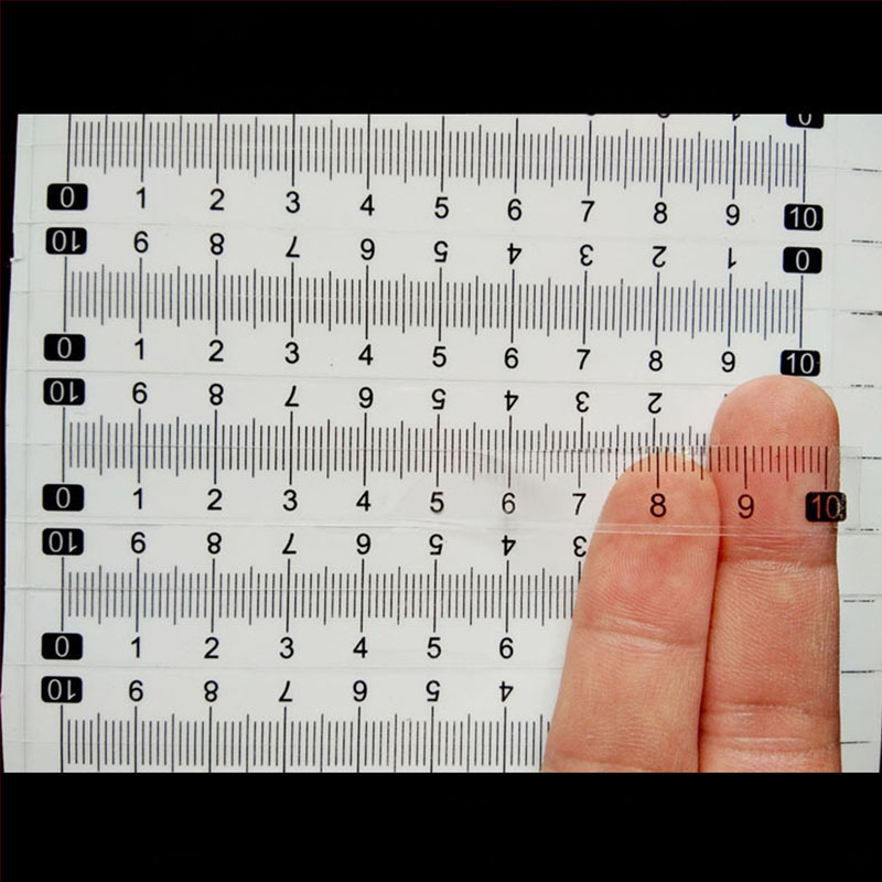 Pašlīmējošs caurspīdīgs lineāls ar centimetru skalu, ūdensizturīga uzlīme