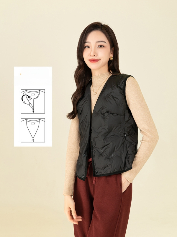 Moteriška pūkinė liemenė, siauras kirpimas, pūkų užpildas 86–90%, vidutinio storio, poliesterio audinys, ilgis 50–65 cm