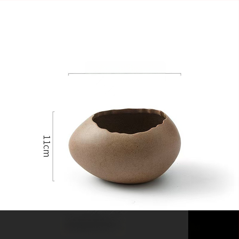 Portselanist magustoidu kauss strutsi kujundusega muna kujul, mikrolaineahi ei toimi