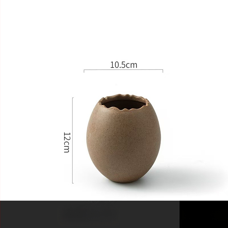 Portselanist magustoidu kauss strutsi kujundusega muna kujul, mikrolaineahi ei toimi