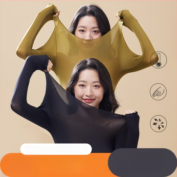 Moterų ultra plonas bešiuvas šilumos termo apatinių komplektas — ilgų rankovių viršūnė ir ilgoms kelnioms; anti‑statinis, kūno formavimas, hidracija hialurono rūgštimi; audinys: nailonas-spandeks (80–90% spandekso).