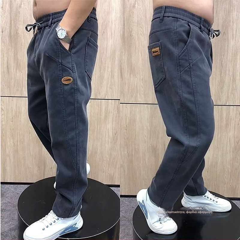Ανδρικά τζιν από denim, άνετη γραμμή, μεσαία μέση, ίσια γραμμή ποδιού, λεπτομέρειες patchwork πλυμένα