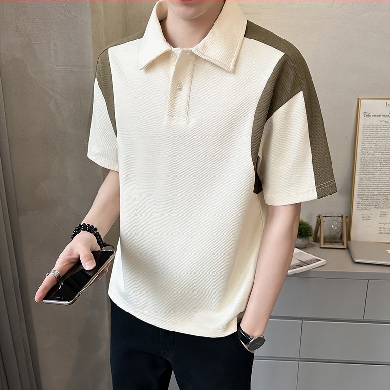 Πόλο πουκάμισο με μπλοκ σχέδιο, κοντά μανίκια, άνετη γραμμή, ύφασμα από μίγμα βαμβακιού.