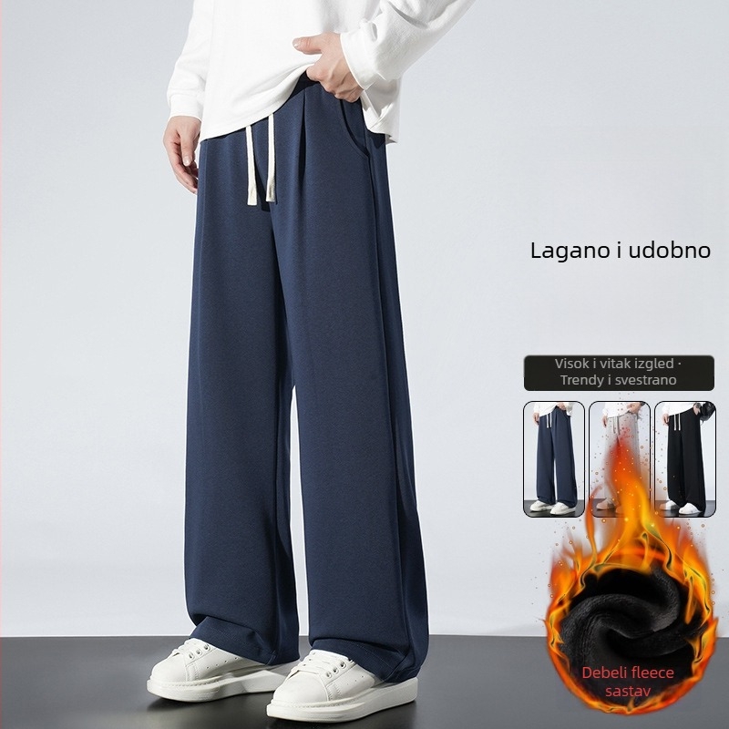 Muške zimske sportske hlače s flis podstavom, opuštena silueta, srednji pas s vezicama, tkanina 65% pamuk / 35% poliester, ravni kroj s džepovima