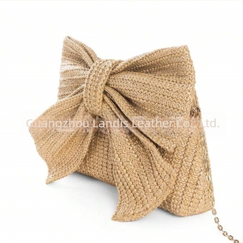 Rukomno torba u obliku mašne, tkanog poliestera, sa zip zatvaračem, proljeće 2025