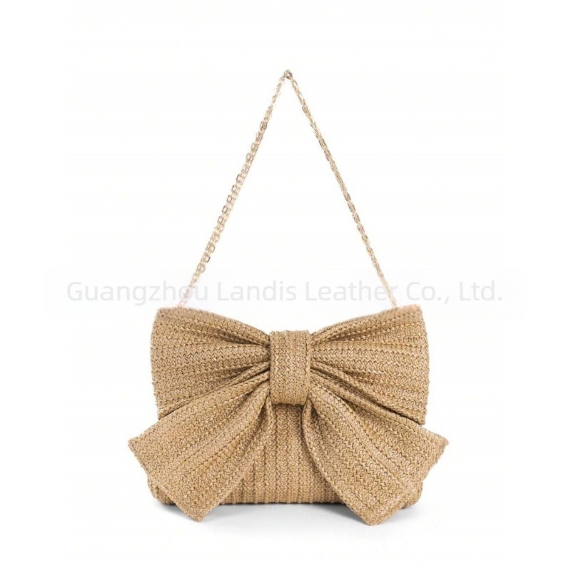 Rukomno torba u obliku mašne, tkanog poliestera, sa zip zatvaračem, proljeće 2025