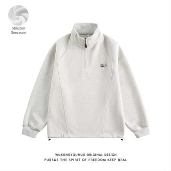 Oversize hoodie s izvezenim detaljem, kapuljačom, stojeći ovratnik i polu-zip