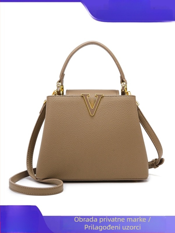 PU bucket torba, gradski minimalistički stil, horizontalni kvadratni oblik, s poklopcem, unutarnja zip džep i džep za ID, jedna naramenica, proljeće 2025, branda Jema Paul