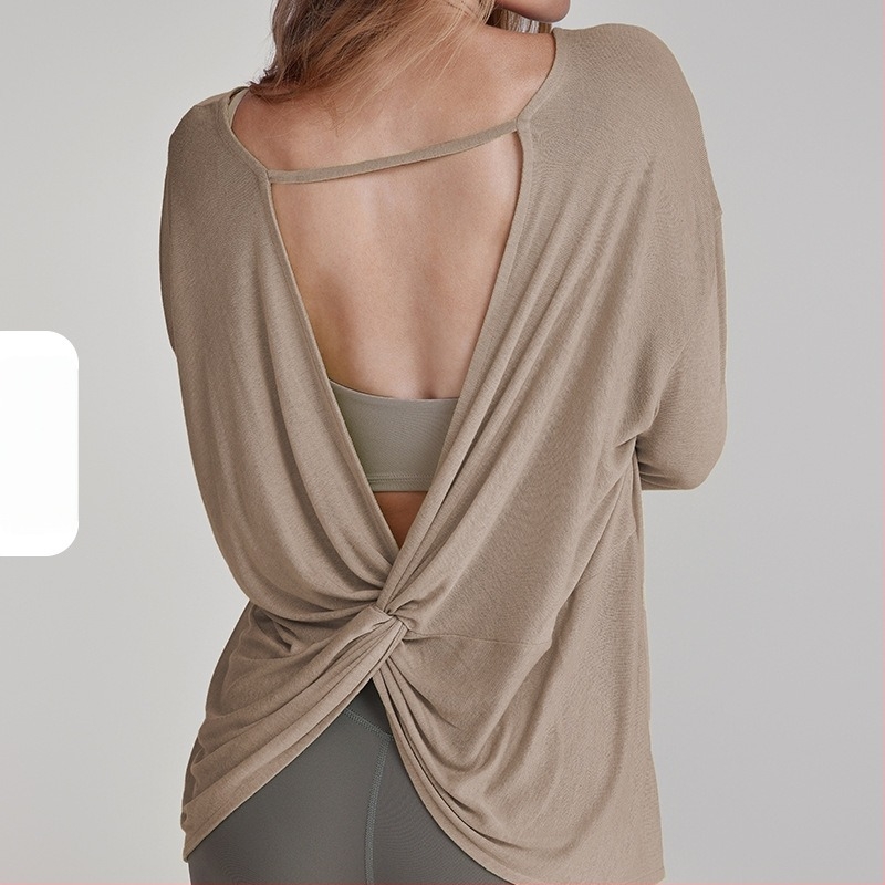 Ženski top za jogu s šupljim leđima i čvorom na leđima, dugi rukavi; Materijal: Tencel vlakno; Sastav: 85% poliester; Podstava: pamuk s 15% viskoze