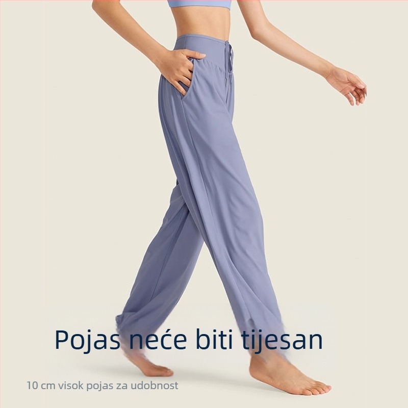 Ženske sportske hlače, prozračne, brzo se suše, visokim pasom, široka silueta, materijal 90% poliester, 10% spandeks