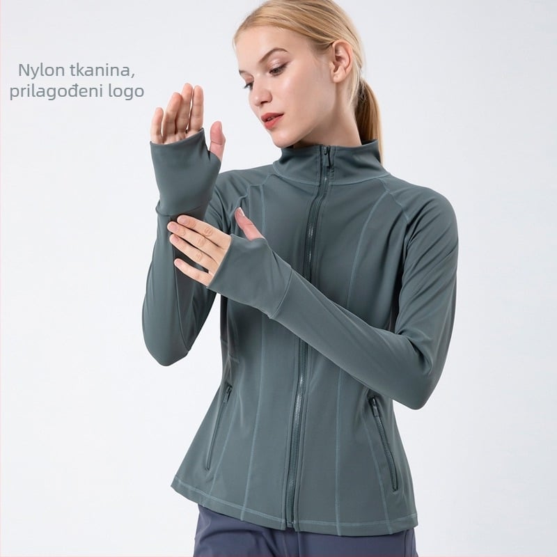 Ženska sportska jakna za jogu i trčanje – brzo sušeća, stojeći ovratnik, dugi rukav; materijal: najlon smjesa 75% + Lycra 25%; podstava: Lycra 25%; bez kapuljače.