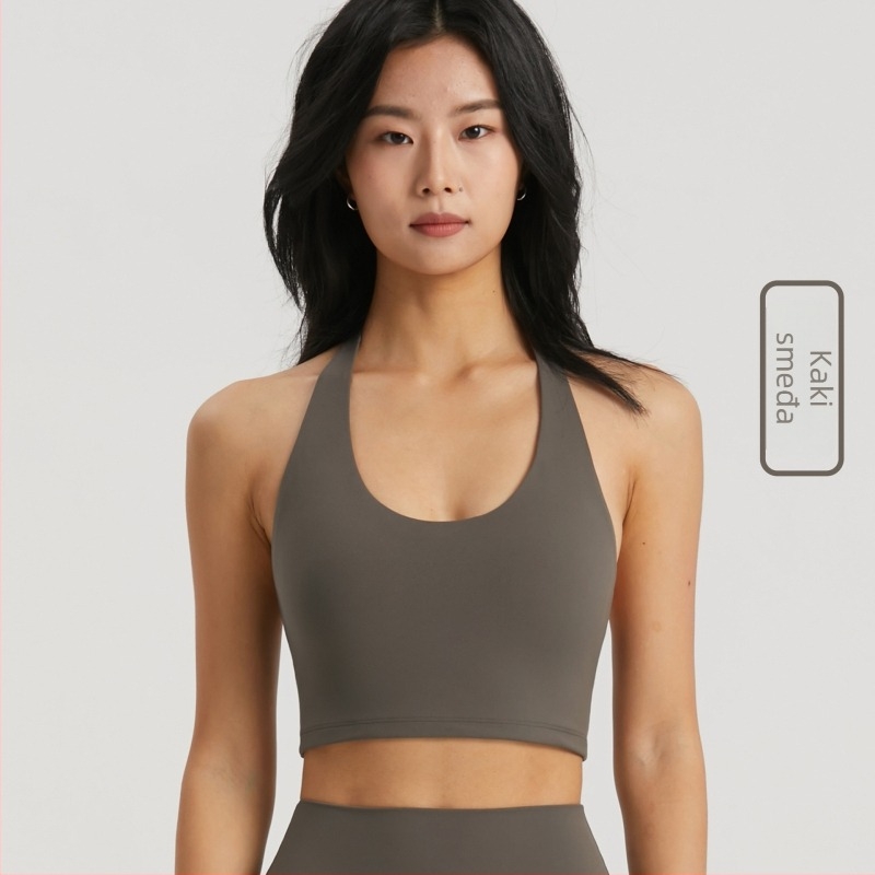 Sportski grudnjak s halter vratom i fiksnim trakama, bez žice, 3/4 košarica, srednje oblikovana, NULS tkanina (80% najlon / 20% spandex), podrška leđima za plesne sportove