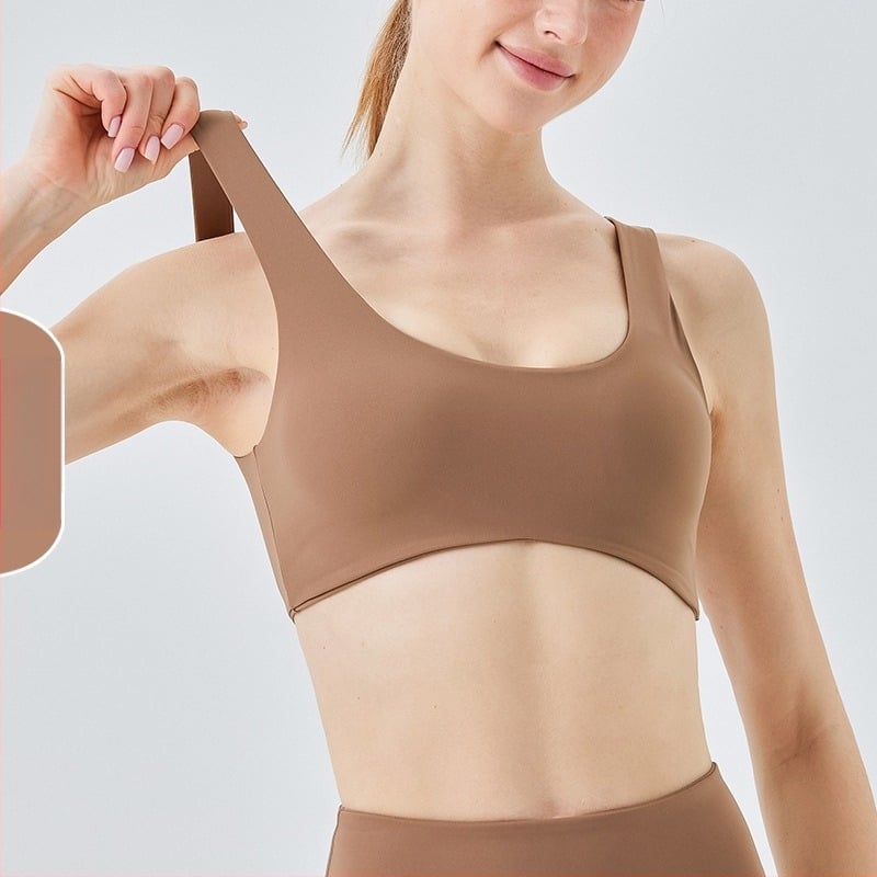 Sportski grudnjak; push-up i otpornost na udarce; 3/4 košarica; srednji oblik košarice; glavni materijal 75% najlon, podstava 25% spandex