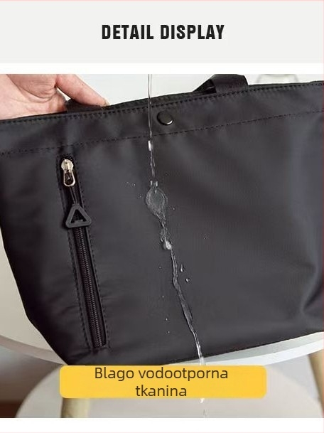 Torba od Oxford platna, gradski minimalistički stil, vodoravni kvadratni oblik, zatvara se zipom, unutarnji džep sa zipom i dvostruke naramenice