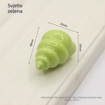 Drška za vrata ormarića u obliku školjke | Materijali: keramika i bakar | Sferni oblik | Ugradnja skrivena | Lijevanje pod pritiskom | Model 1362