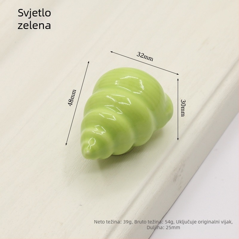 Drška za vrata ormarića u obliku školjke | Materijali: keramika i bakar | Sferni oblik | Ugradnja skrivena | Lijevanje pod pritiskom | Model 1362