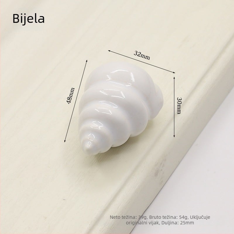 Drška za vrata ormarića u obliku školjke | Materijali: keramika i bakar | Sferni oblik | Ugradnja skrivena | Lijevanje pod pritiskom | Model 1362