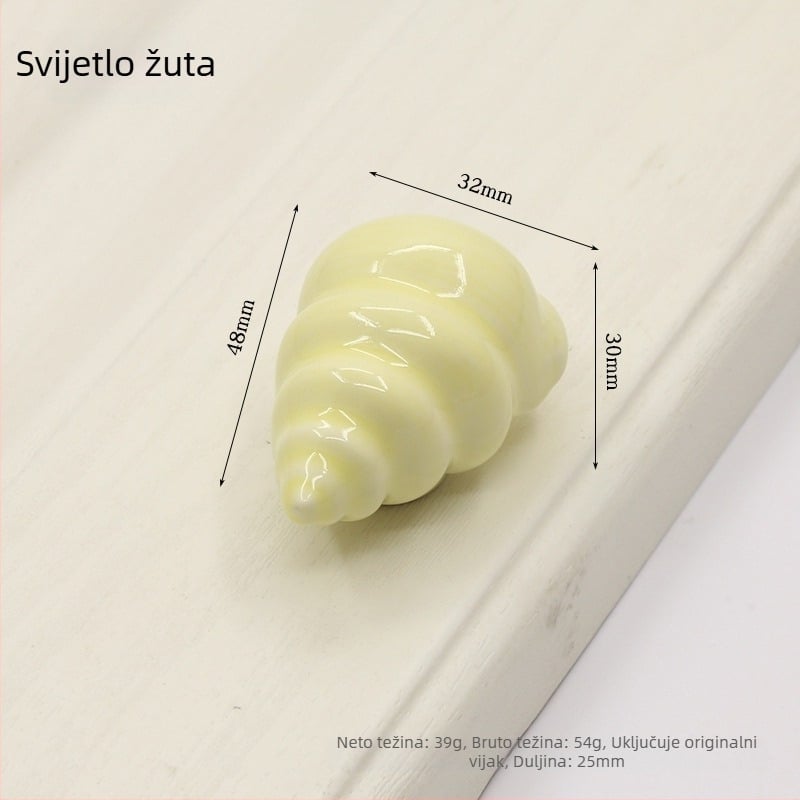 Drška za vrata ormarića u obliku školjke | Materijali: keramika i bakar | Sferni oblik | Ugradnja skrivena | Lijevanje pod pritiskom | Model 1362