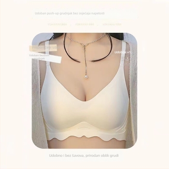 Ženski grudnjak, bezšivan, bez žice, prozračan najlon materijal; košarice 3/4 s debelim oblikovanim košaricama; čvrste dvostruke naramenice; stražnje kopčanje s četiri reda.