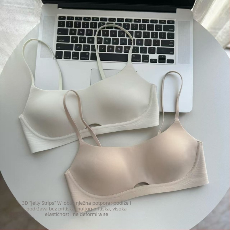 Besprijekorna grudnjak, prozračan, od najlona; tanke oblikovane šalice; fiksne dvostruke naramenice; stražnje dvostruko kopčanje; podstava od poliestera.