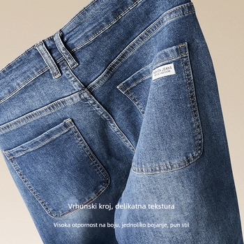 Pamuk denim traperice, slobodan ravni kroj, srednji pojas, zatvarač na zip, više džepova, za jesen
