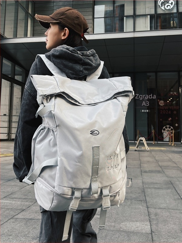 JUST A MAN unisex ranac od Oxford platna, prozračan i vodootporan, zakrivljene naramenice, za učenike nižih i srednjih razreda