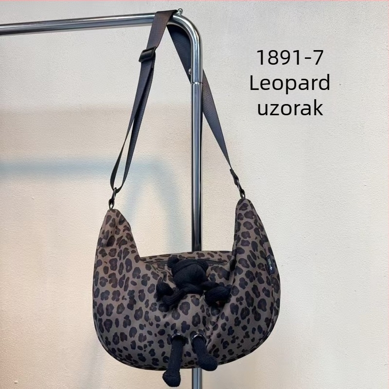 Kanvas crossbody torbica s leopardim uzorkom, zatvaračem i unutarnjim džepovima