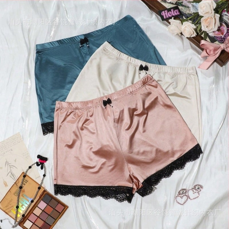 Női seamless boxer rövidnadrág középmagas derekú, kötött nejlon anyag 90–95%, ágyék rész 100% pamut, masni mintával