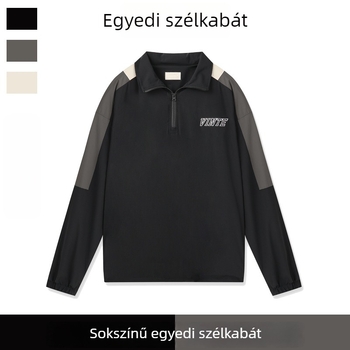 Színblokkoló félzip kabát szélálló és vízlepergető kivitelben, álló gallér, laza szabás