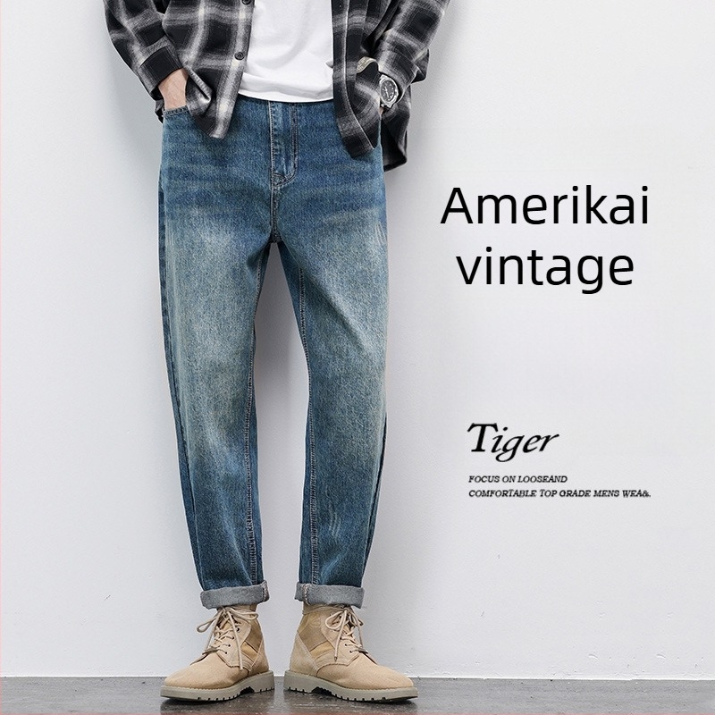 Férfi farmernadrág, lazított szabás, középső derekú, cipzáras záródás, pamut-denim