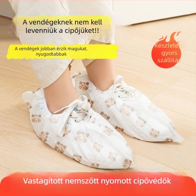 Egyszer használatos, nemszövött anyagból készült nyomtatott cipővédők belső használatra, vastagított, csúszásmentes, medve mintával