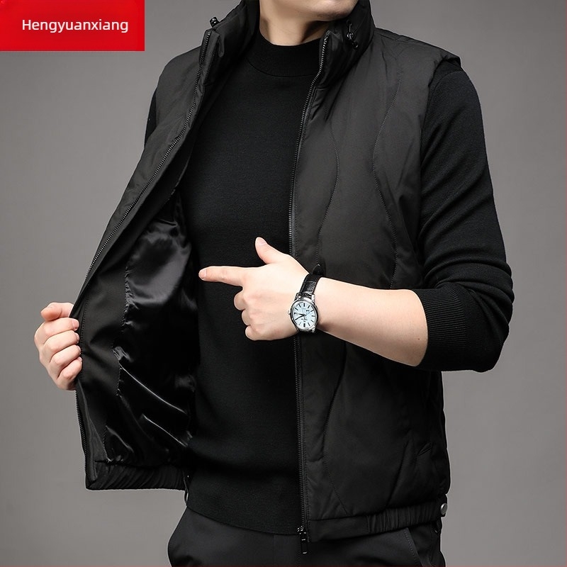 Fehér kacsa pehely töltésű mellény, álló gallér, cipzár, több zseb, őszi-téli szezonra